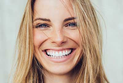 Closeup Woman Smiling After Cosmetic Dentistry in Franklin MI