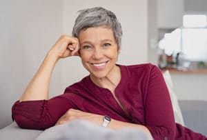 Woman Smiling with Dentures in Metro Detroit