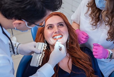 Woman Receiving Zoom Teeth Whitening in Birmingham MI