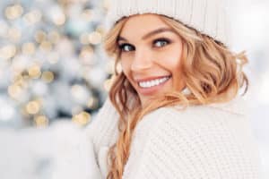 Woman Smiling With Holiday Theme