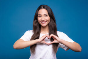 Woman with Hands in Heart Shape