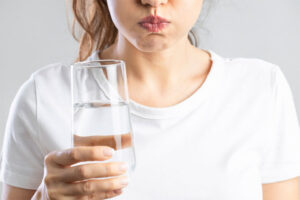 Woman with Water Glass