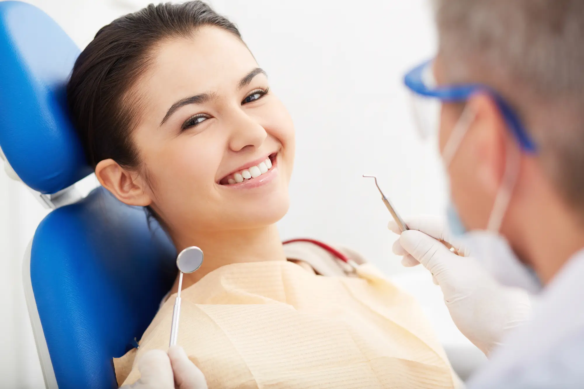 Happy patient after Restorative Dentistry Birmingham MI dental treatment.